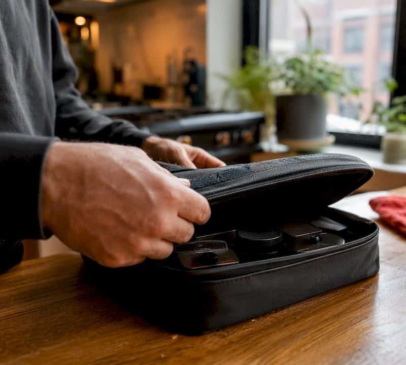 Hands opening cannabis delivery bag