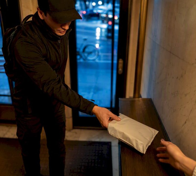 Discreet cannabis delivery arriving at NYC apartment