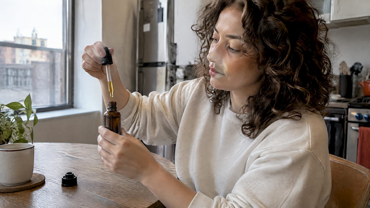 Adult measuring drops from tincture bottle
