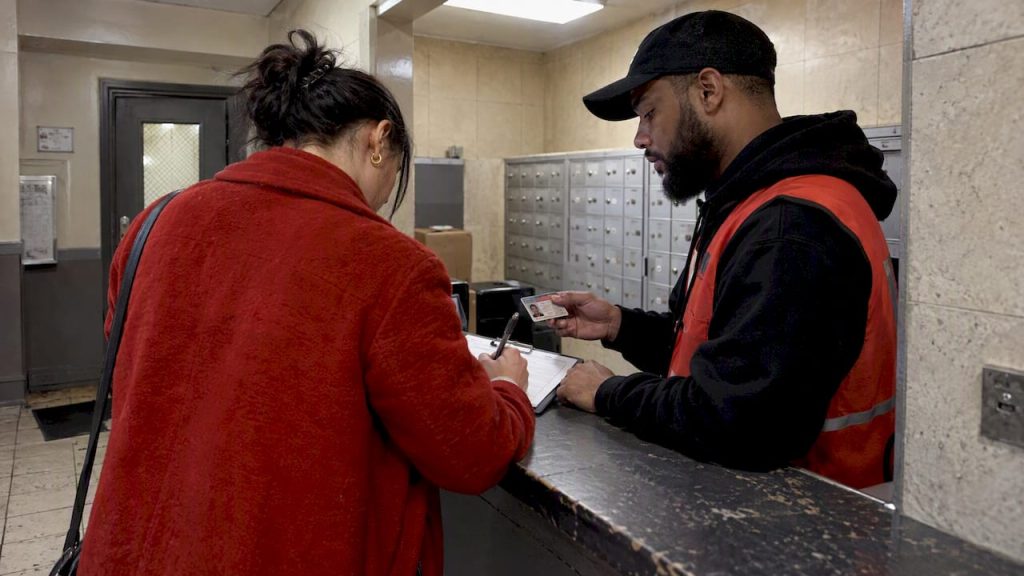 Customer presenting ID during cannabis delivery